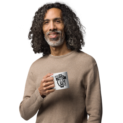 Smiling middle-aged man holding a white 11 oz Man of Faith Christian lion and cross mug.