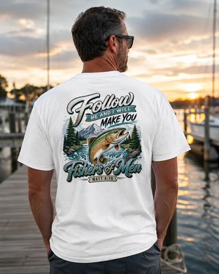 Back view of a man wearing a white Matthew 4:19 Fishers of Men fishing T-shirt at sunset.