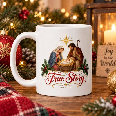 11 oz Christian Christmas Nativity mug featuring True Story and Luke 2:11 displayed in a cozy holiday scene with evergreen, o