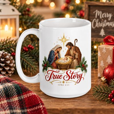 15 oz white Christian Christmas mug with Mary, Joseph, baby Jesus, True Story lettering, and Luke 2:11 in a festive Christmas