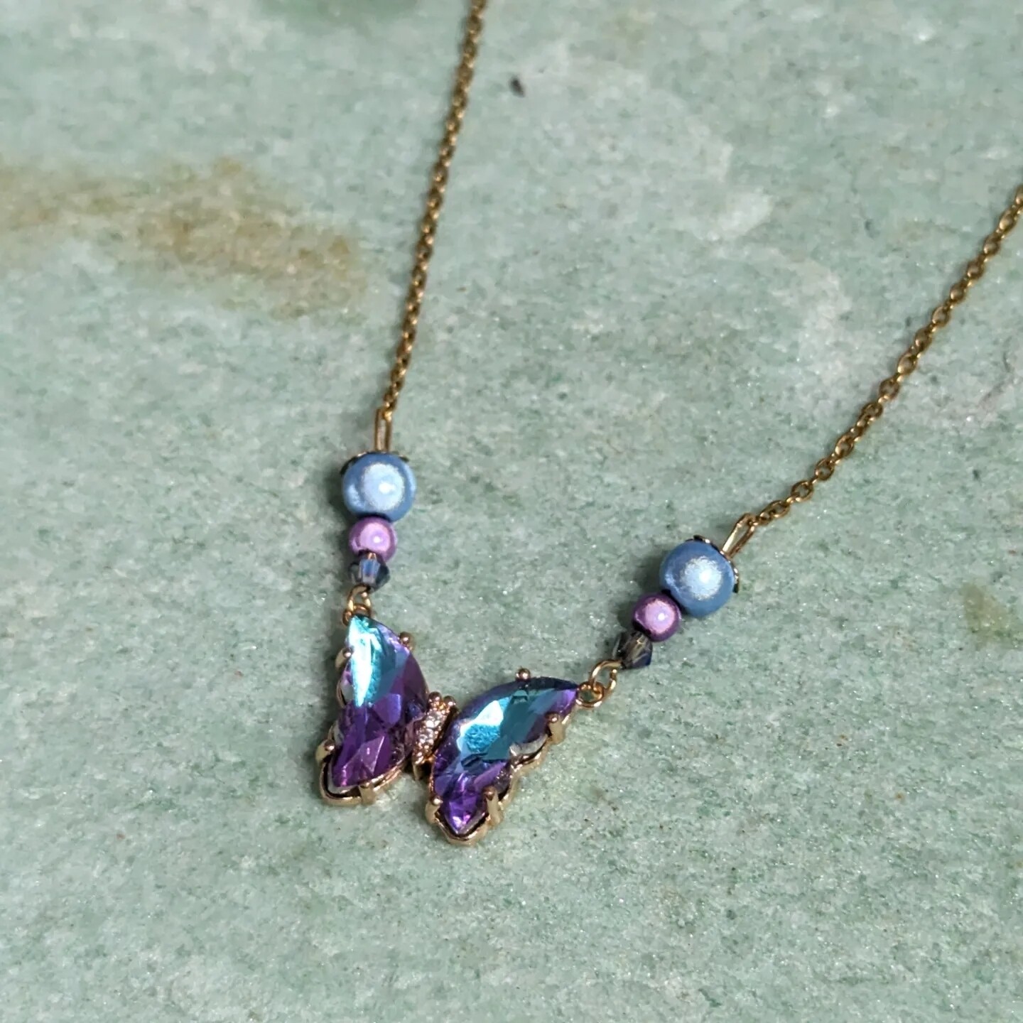 Collier papillon de cristal