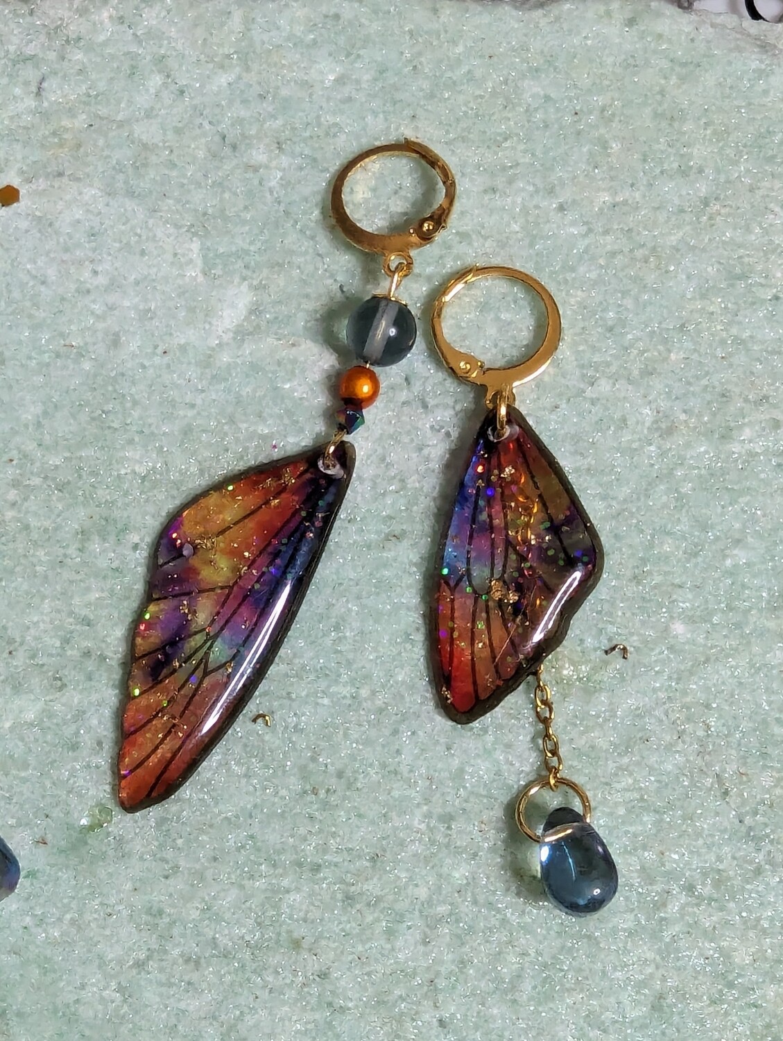 Ailes cosmique asymétrique