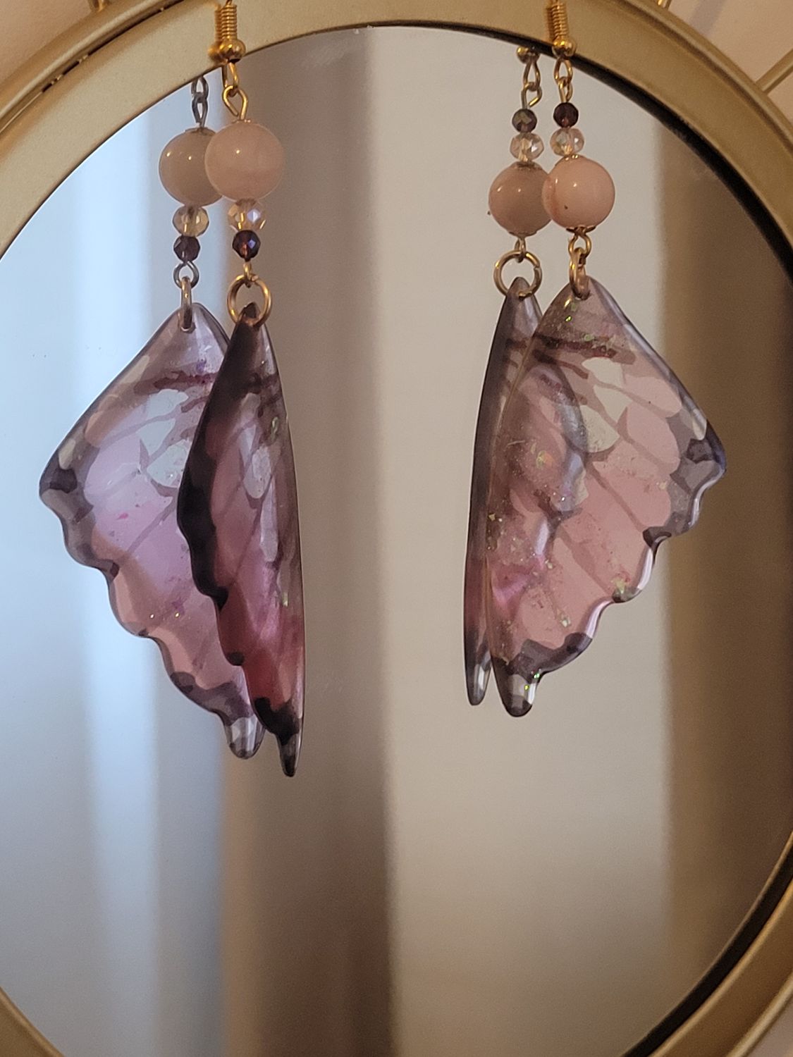 Boucles d&#39;oreilles papillon rose bonbon