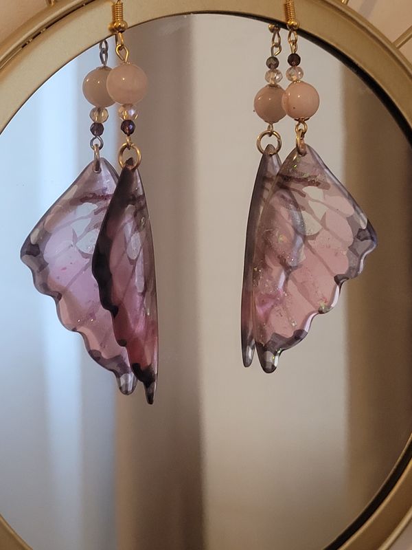 Boucles d&#39;oreilles papillon rose bonbon