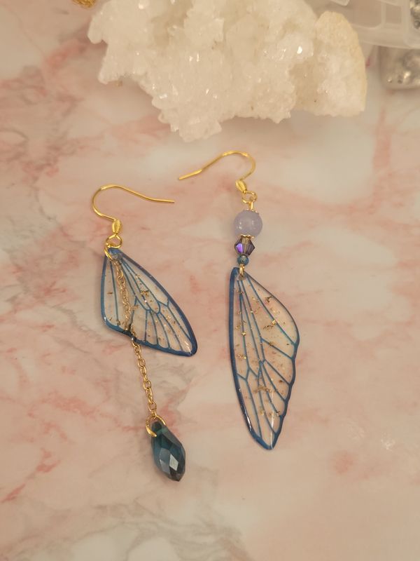 Aqua boucles d&#39;oreilles papillon asymétrique