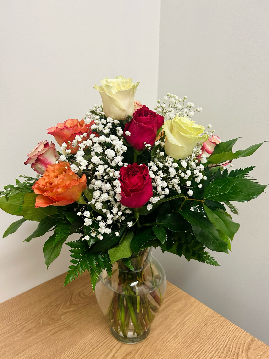 1 Dozen Assorted Colored Roses In Vase