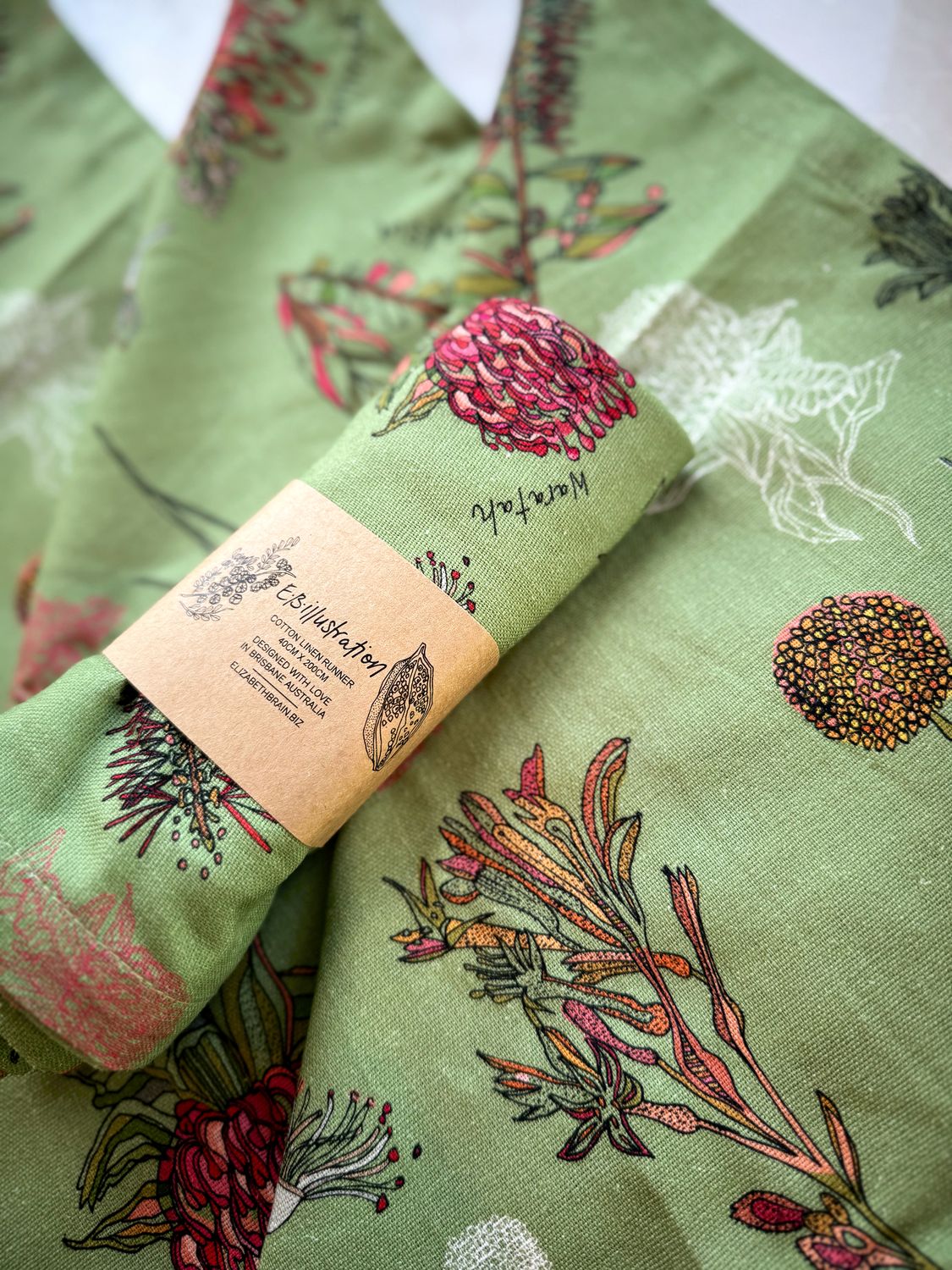 'Native Flora' table runner in olive green