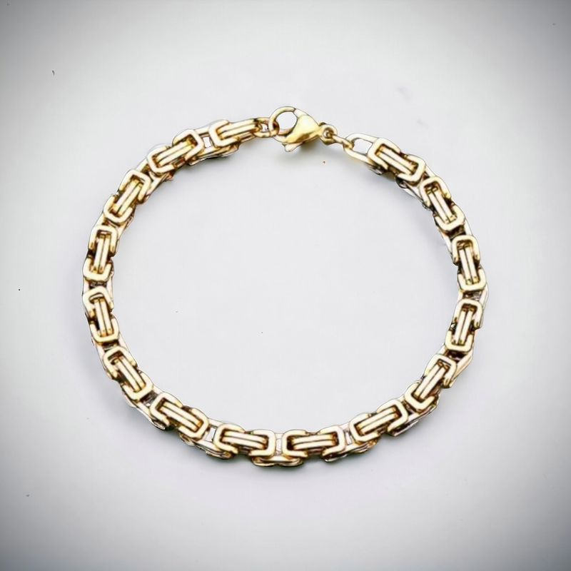 Elegant Gold and Silver Bracelet with Black Accents