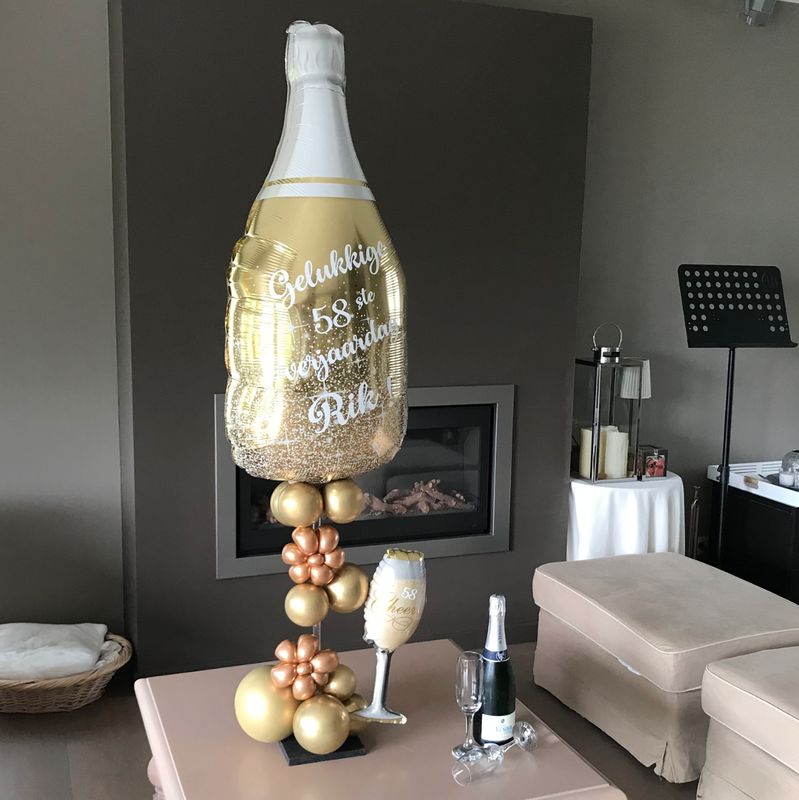 CHAMPAGNE FLES XL op statief