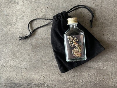 Koesterflesje - Vlinder