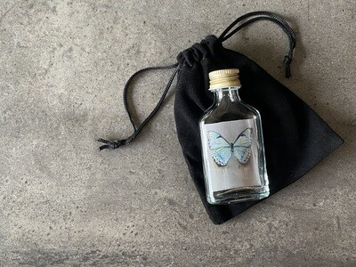 Koesterflesje - Vlinder