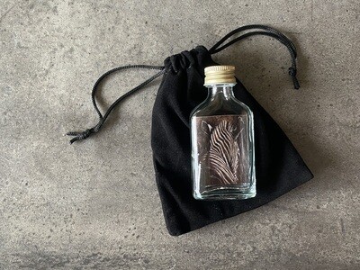 Koesterflesje met de wijsheid van de zebra