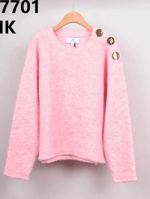 Pull met gouden knopen aan de schouder verkrijgbaar in twee verschillende kleuren Pull met gouden knopen aan de schouder verkrijgbaar in twee verschillende kleuren