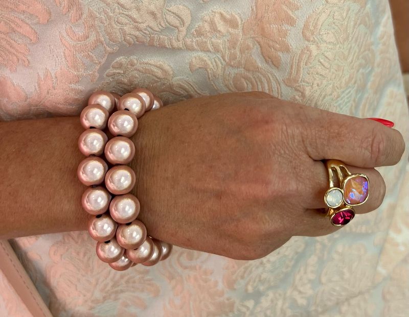 Set van twee armbanden in het roze