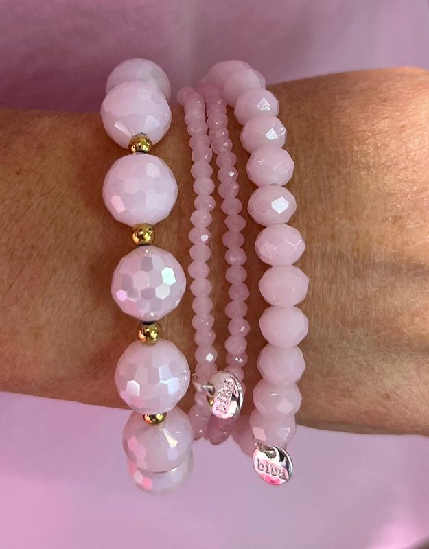 Set van lichtroze armbandjes