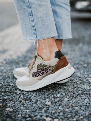 Sneakers van Nero Giardini met leopard en bruine tinten