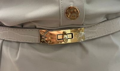 Beige verstelbare riem