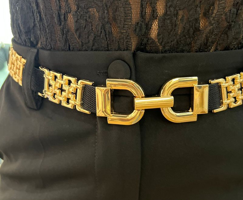 Zwarte riem afgewerkt met goud