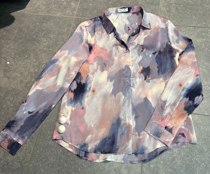 Prachtige blouse met lila tinten