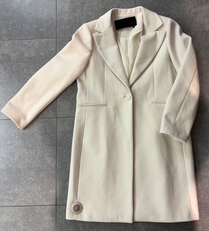 Mooie mantel verkrijgbaar in vijf verschillende kleuren