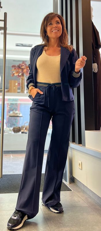 Donkerblauwe travelbroek met gouden boordje