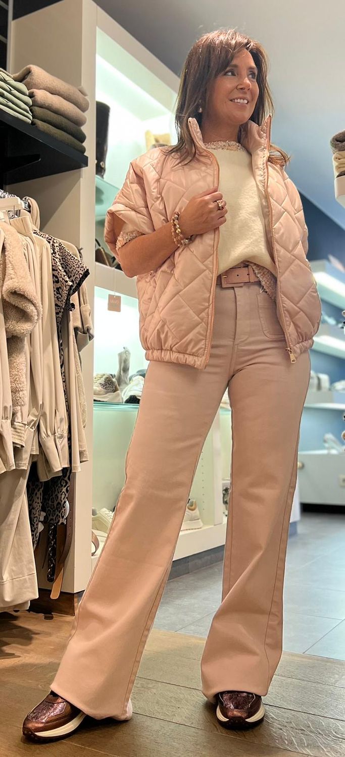Lichtroze broek met zakjes en wijde pijpen Lichtroze broek met zakjes en wijde pijpen