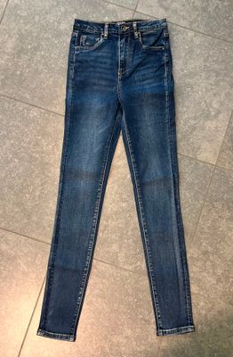 Skinny jeans hoge taille
