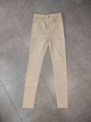 Beige skinny jeans
