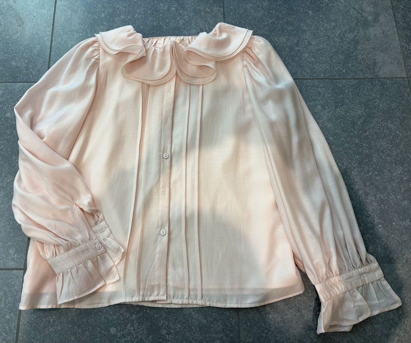 Roze blouse met franjes