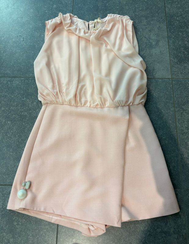 Roze jumpsuit zonder mouwen