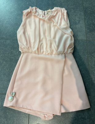Roze jumpsuit zonder mouwen