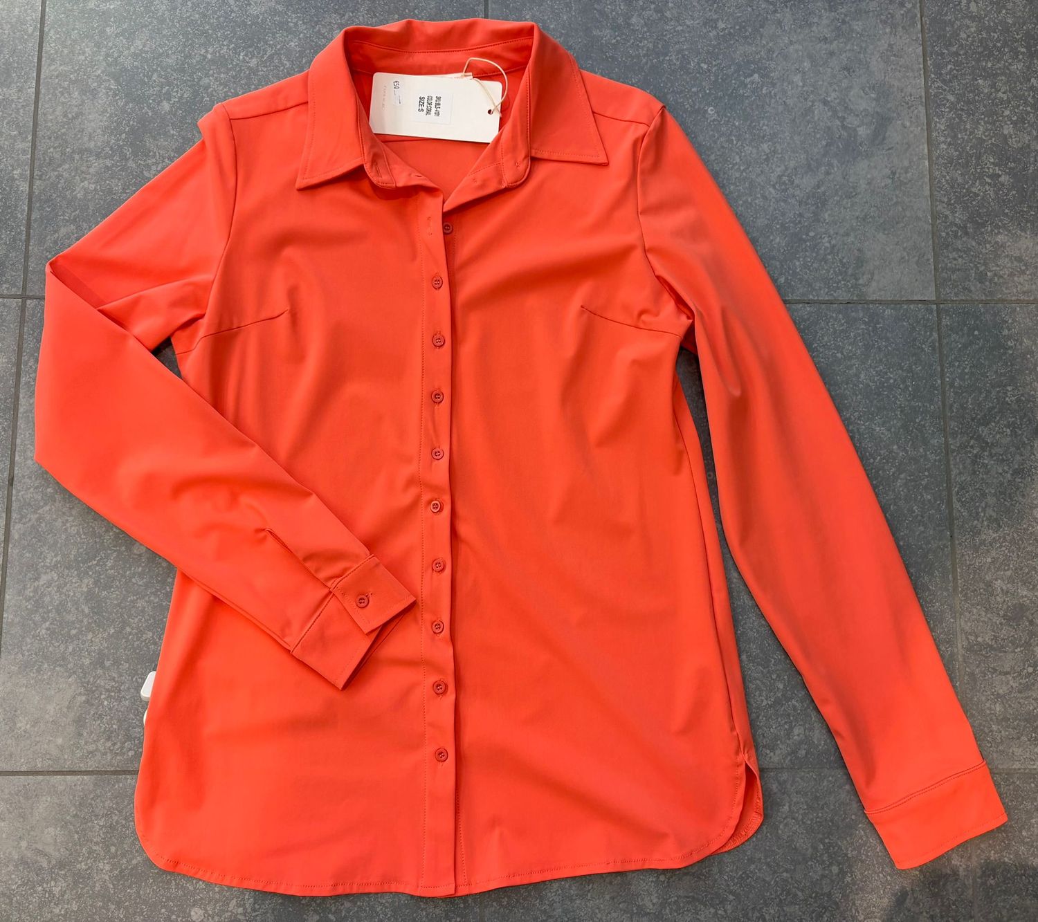 Oranje blouse in travelstof Oranje blouse in travelstof