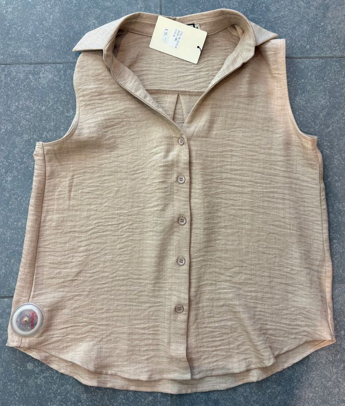 Blouse zonder mouwen in het beige