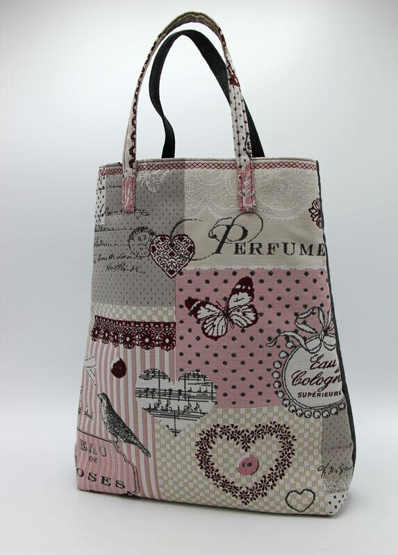 Sac à main en tissu de forme triangulaire