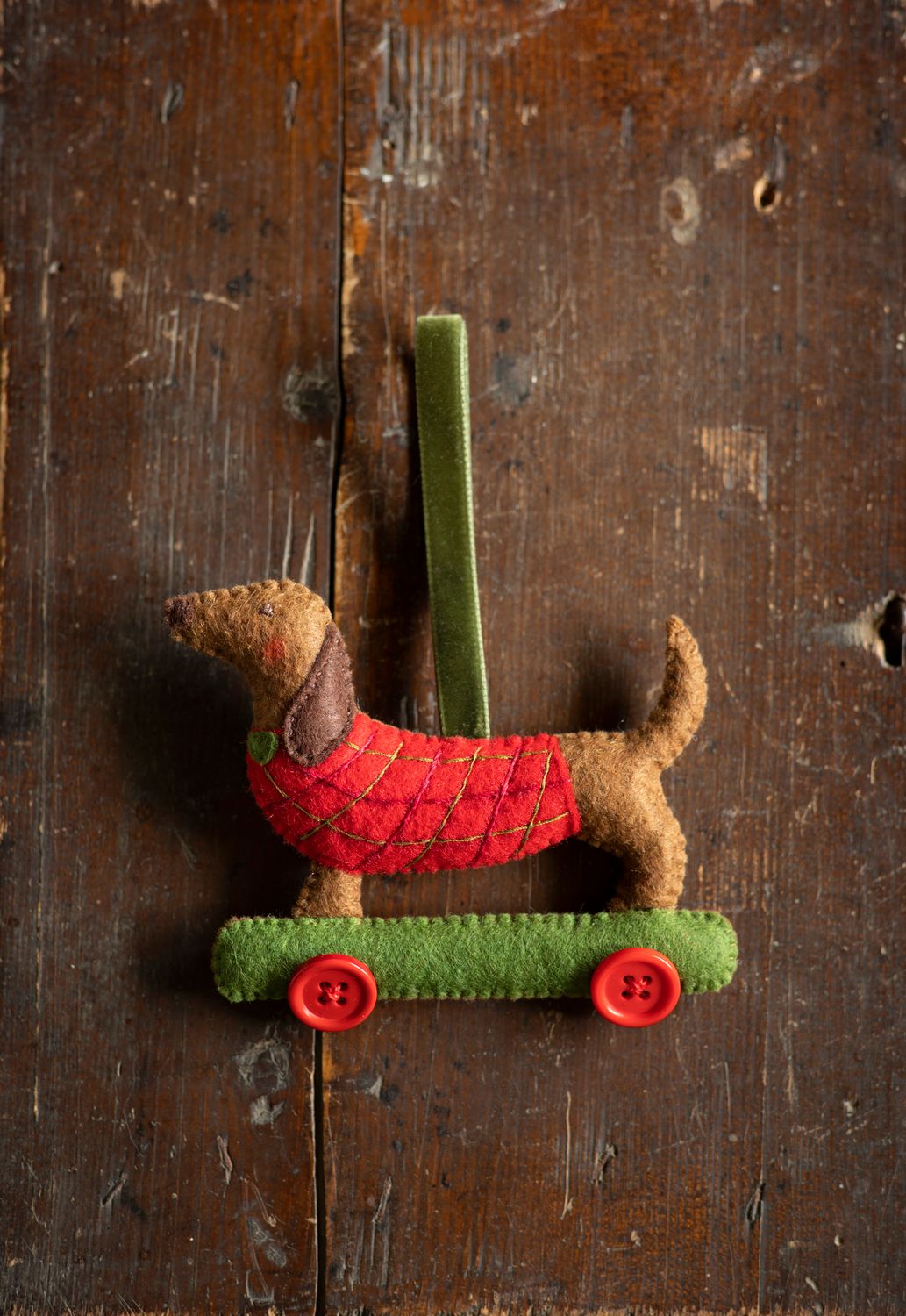Dachshund on wheels handmade felt decoration