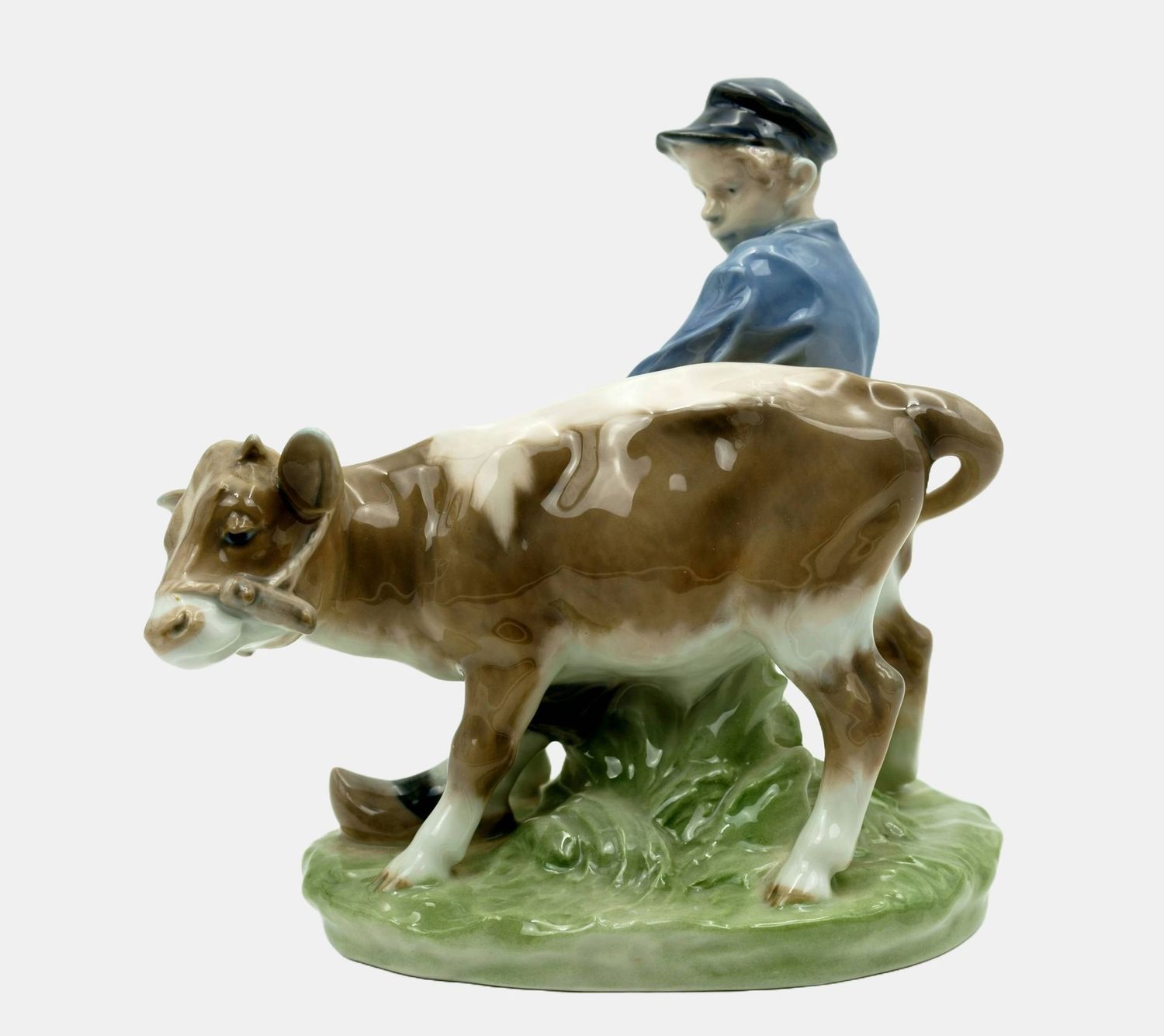 Royal Copenhagen / Thomsen, Christian (1860-1921), Boy with Calf