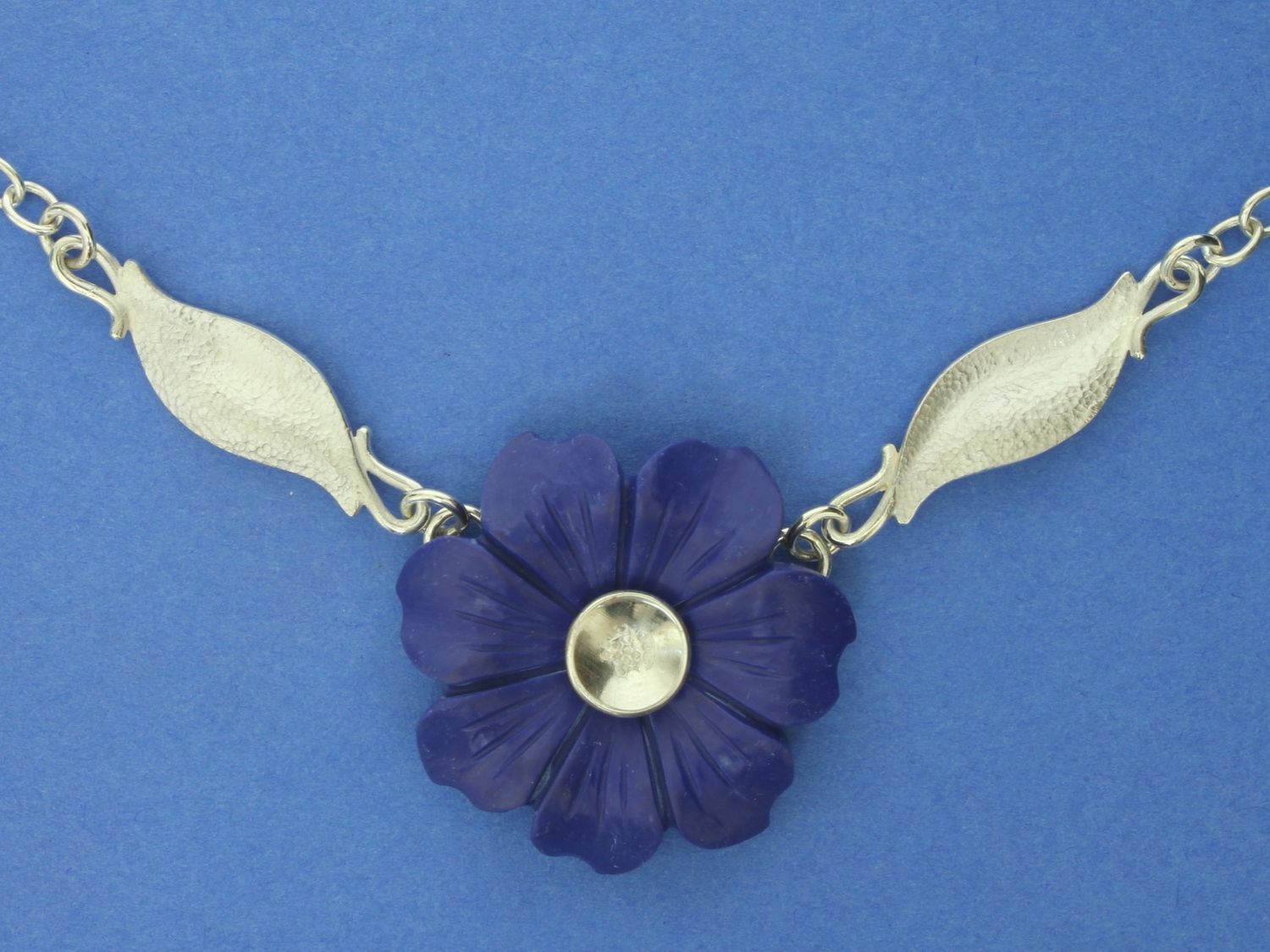 Lapis Lazuli flower Silver Necklace with repousse leaves