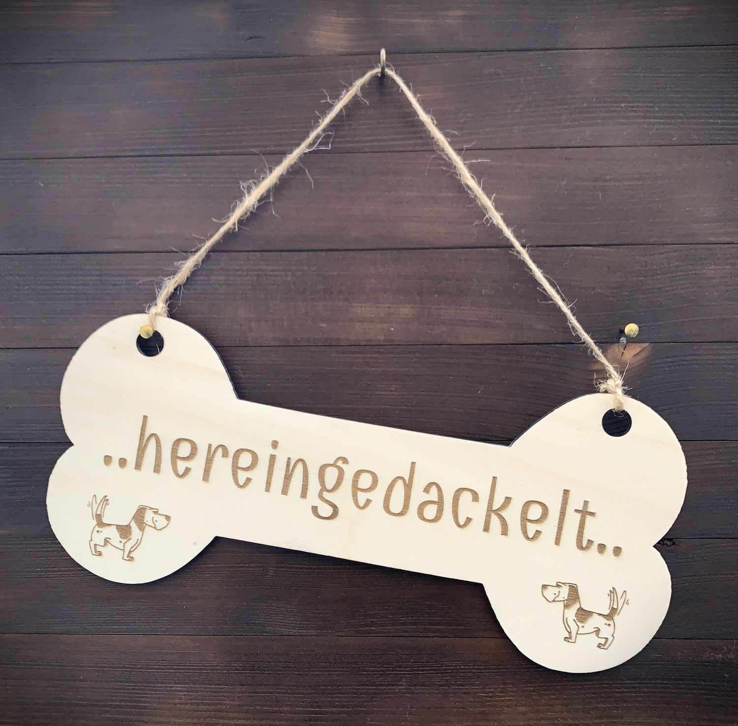 Holzschild in Knochenform für Hundebesitzer