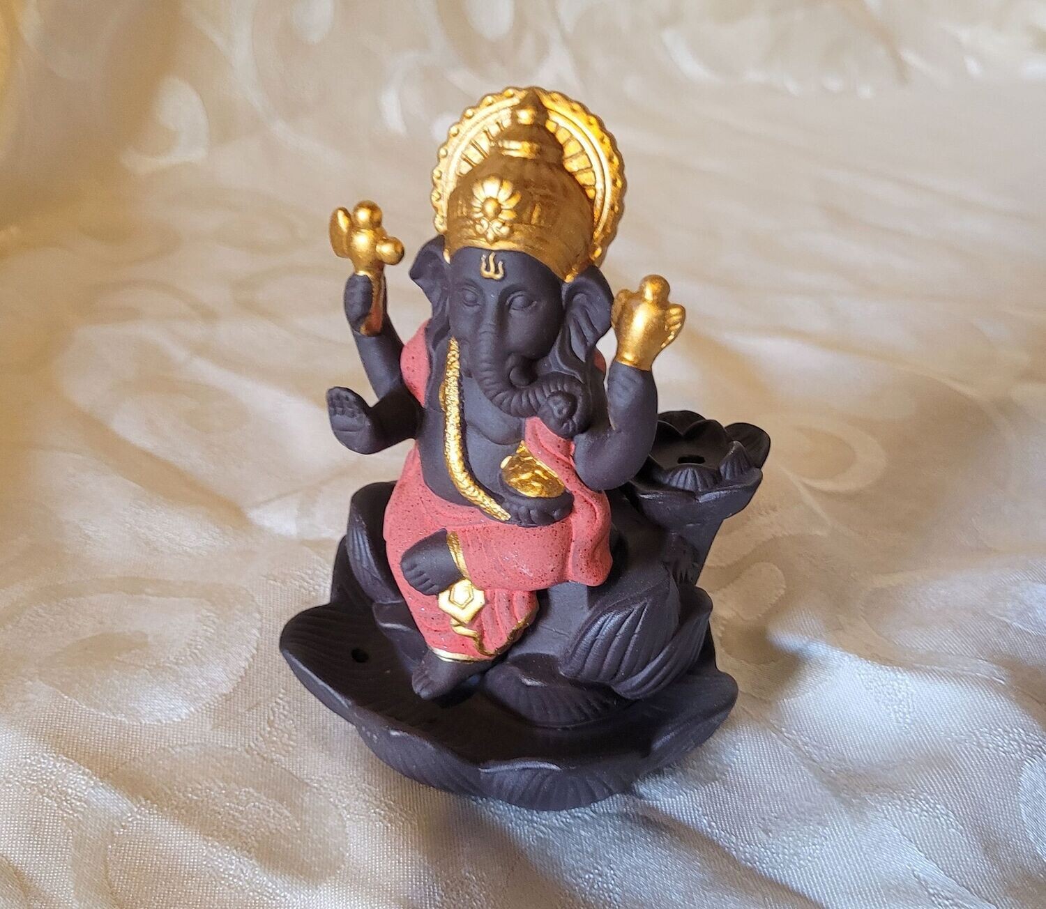 ​Rückfluss-Brunnen - Ganesha