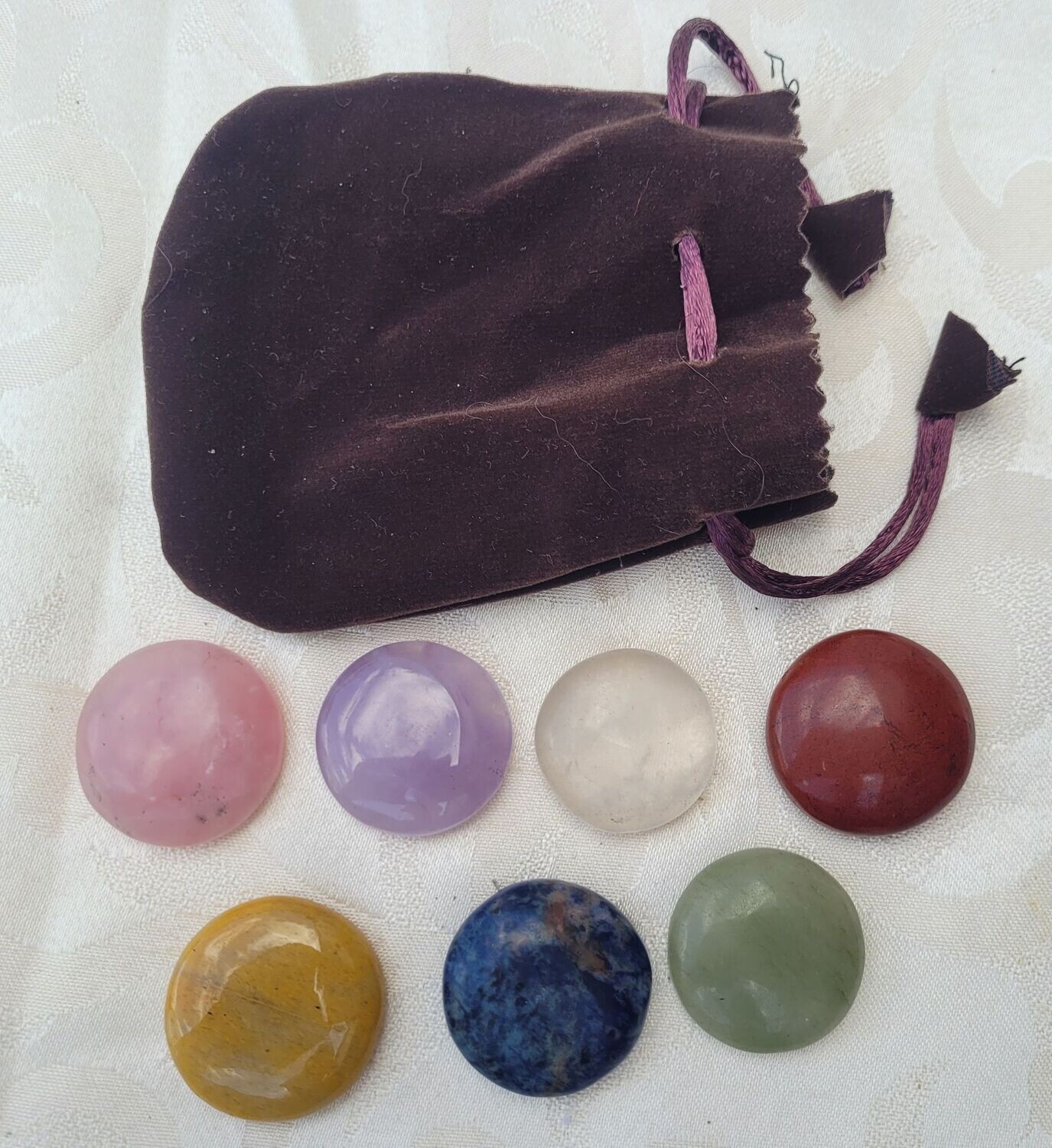 7 Chakra Edelsteinscheiben im Samtbeutel