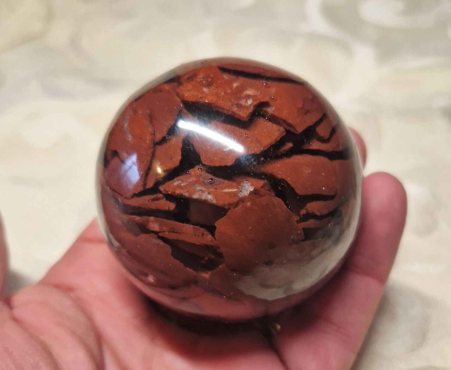 Orgonit Kugel mit roten Jaspis Rohsteinen - ca. 6,5 cm