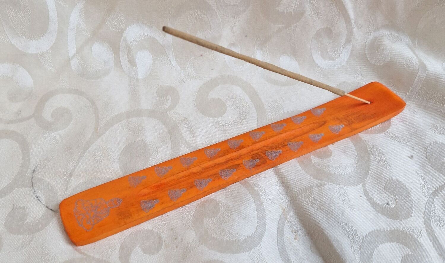 Räucherstäbchenhalter aus farbigem Holz - Buddha