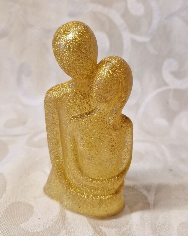 ​​Liebespaar in Gold-Glitzer