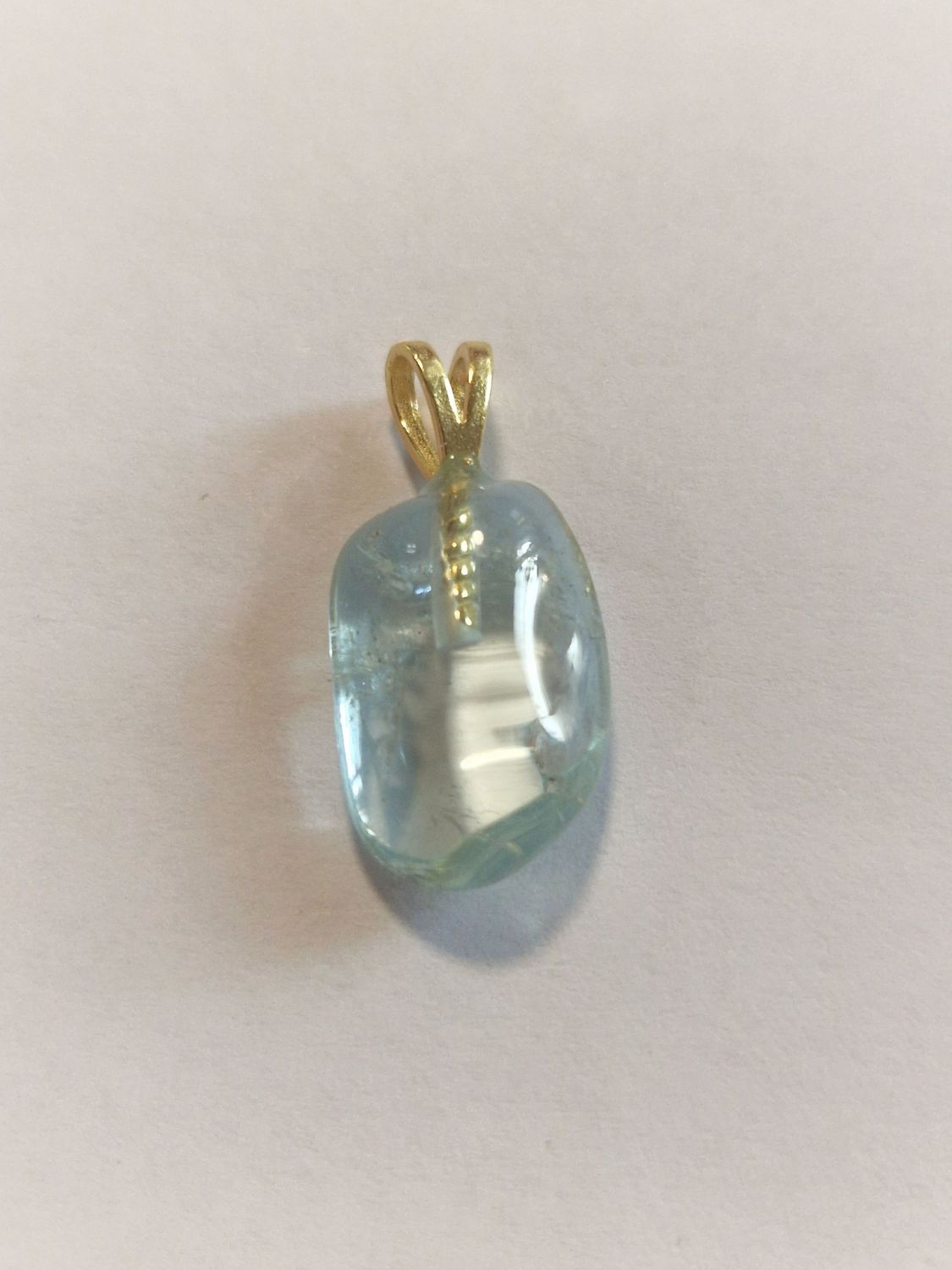 ​Aquamarin mit vergoldeter Silberöse 925