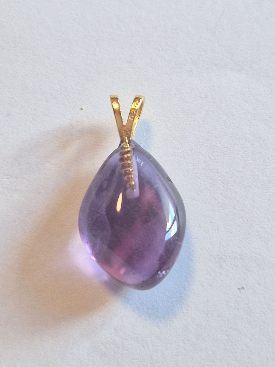 ​Amethyst mit vergoldeter Silberöse 925