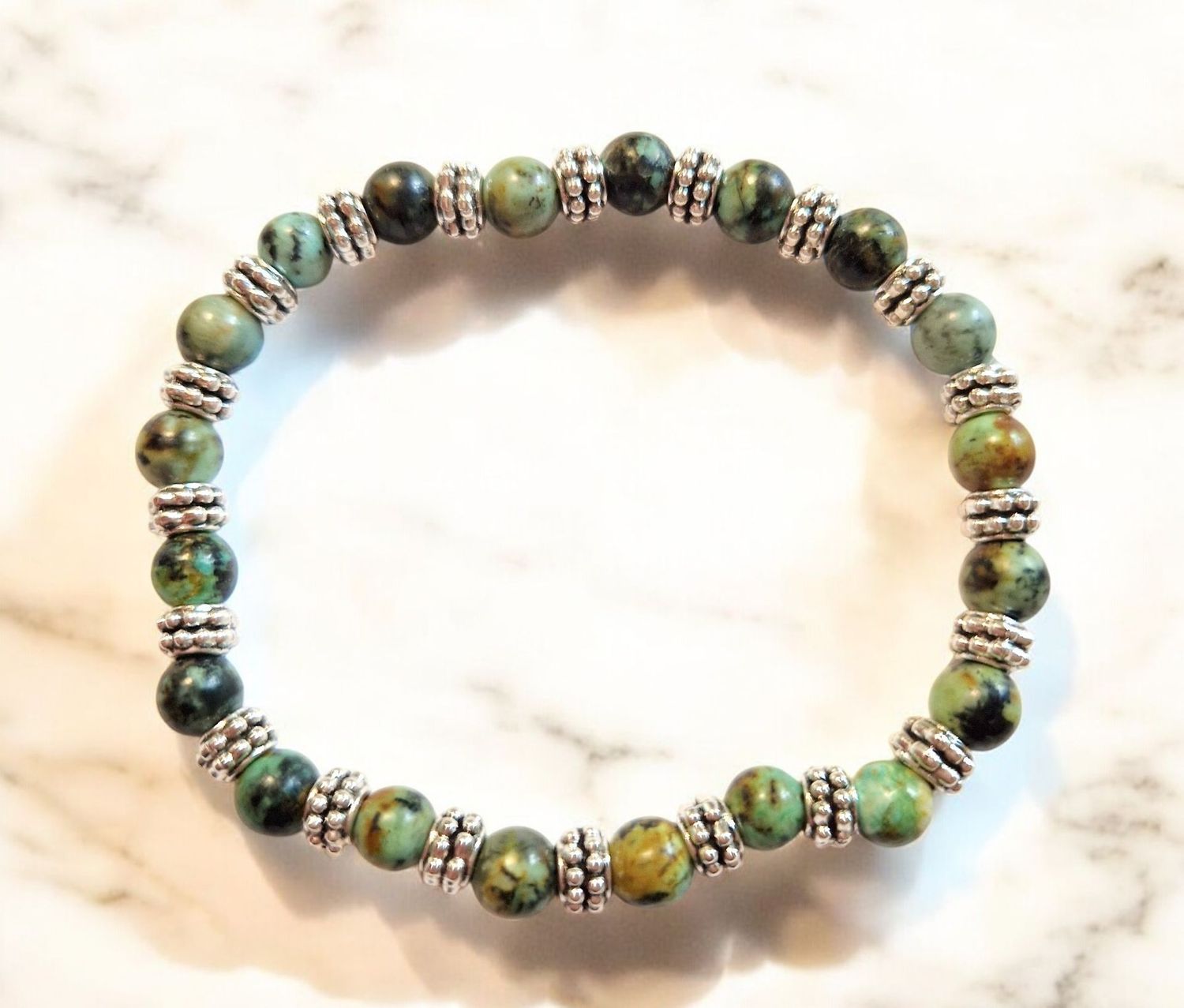 Armband - Türkis - A Qualität - mit silberfarbenen Metallelementen - 6 mm Armband - Türkis - A Qualität - mit silberfarbenen Metallelementen - 6 mm