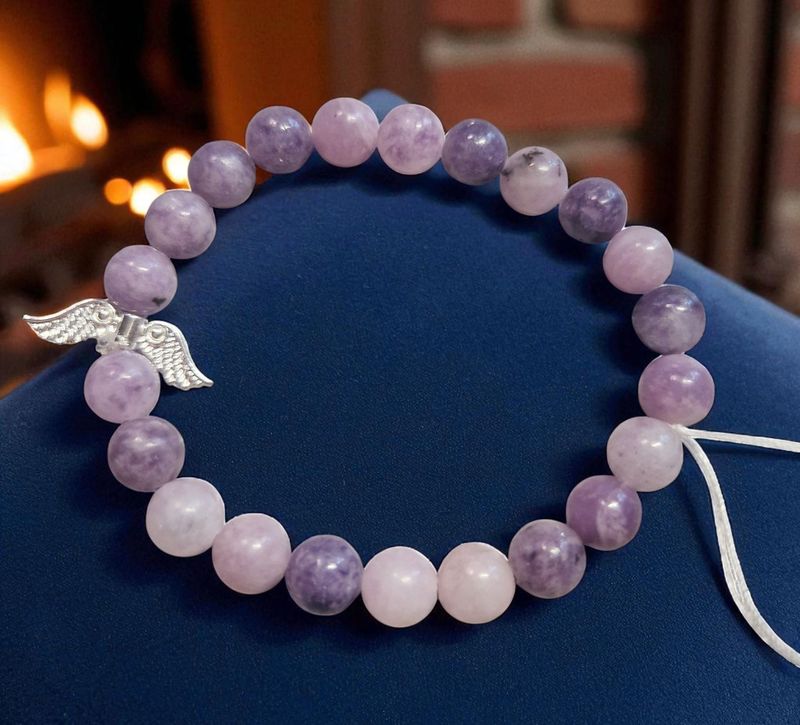 Armband - Lepidolith - AB Qualität - mit silberfarbenen Engelsflügel - 8 mm