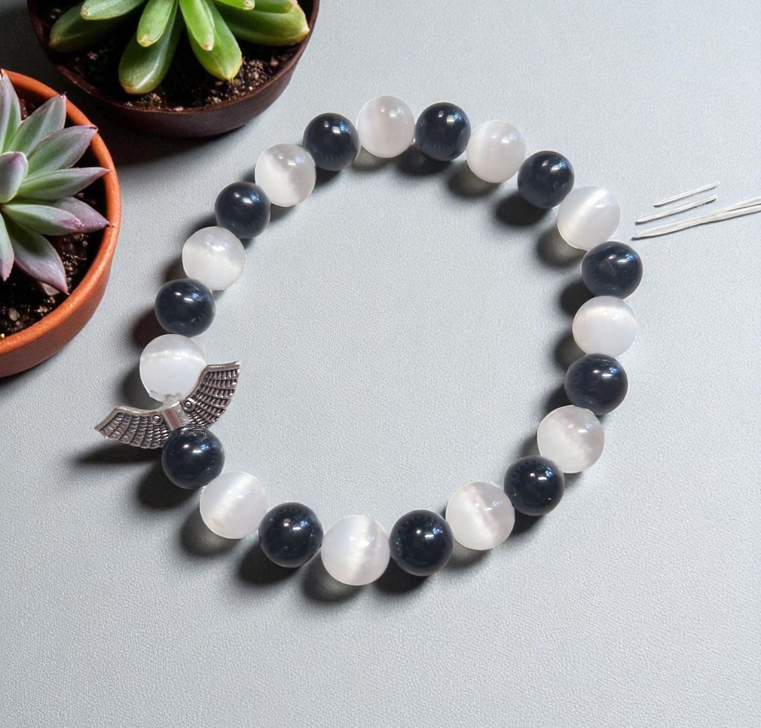 Armband -Turmalin & Selenit - A & AA Qualität - silberfarbener Engelsflügel - 8 mm Armband -Turmalin & Selenit - A & AA Qualität - silberfarbener Engelsflügel - 8 mm