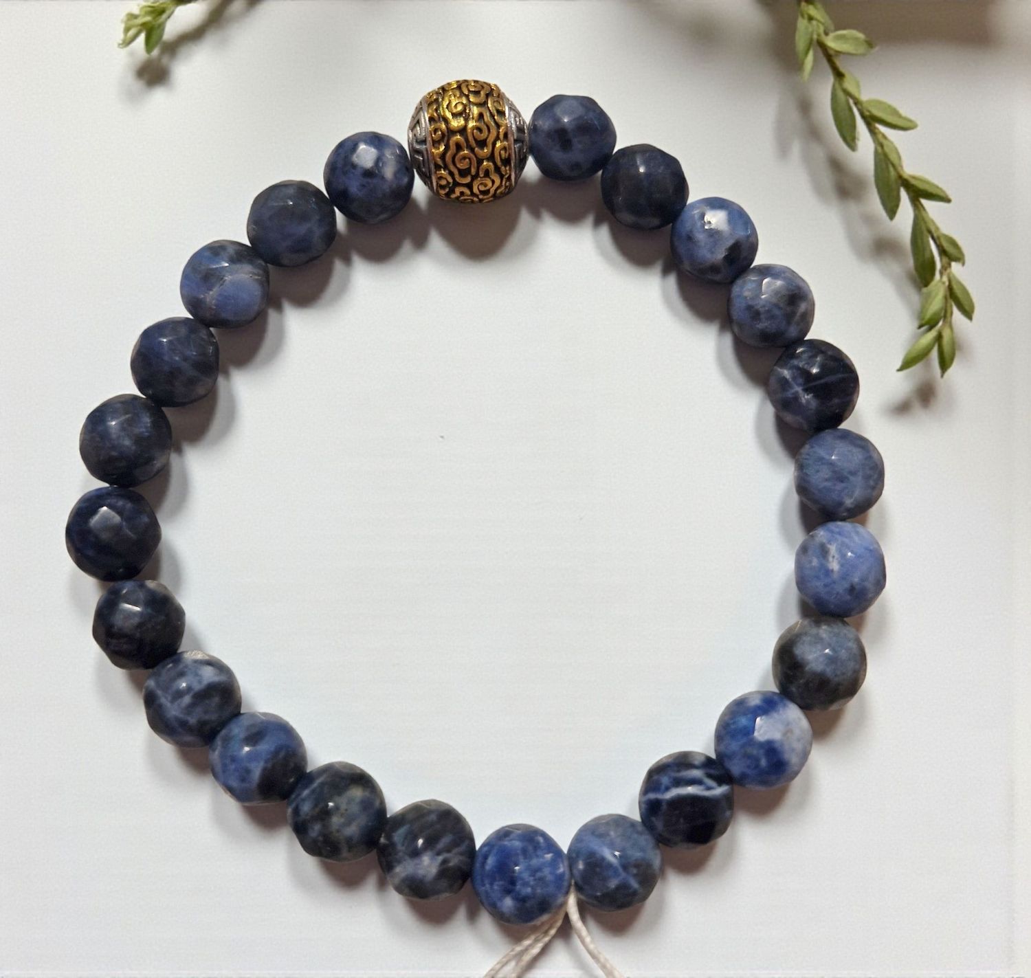 Armband - Sodalith facetiert - silber/gold Kugel - 8 mm