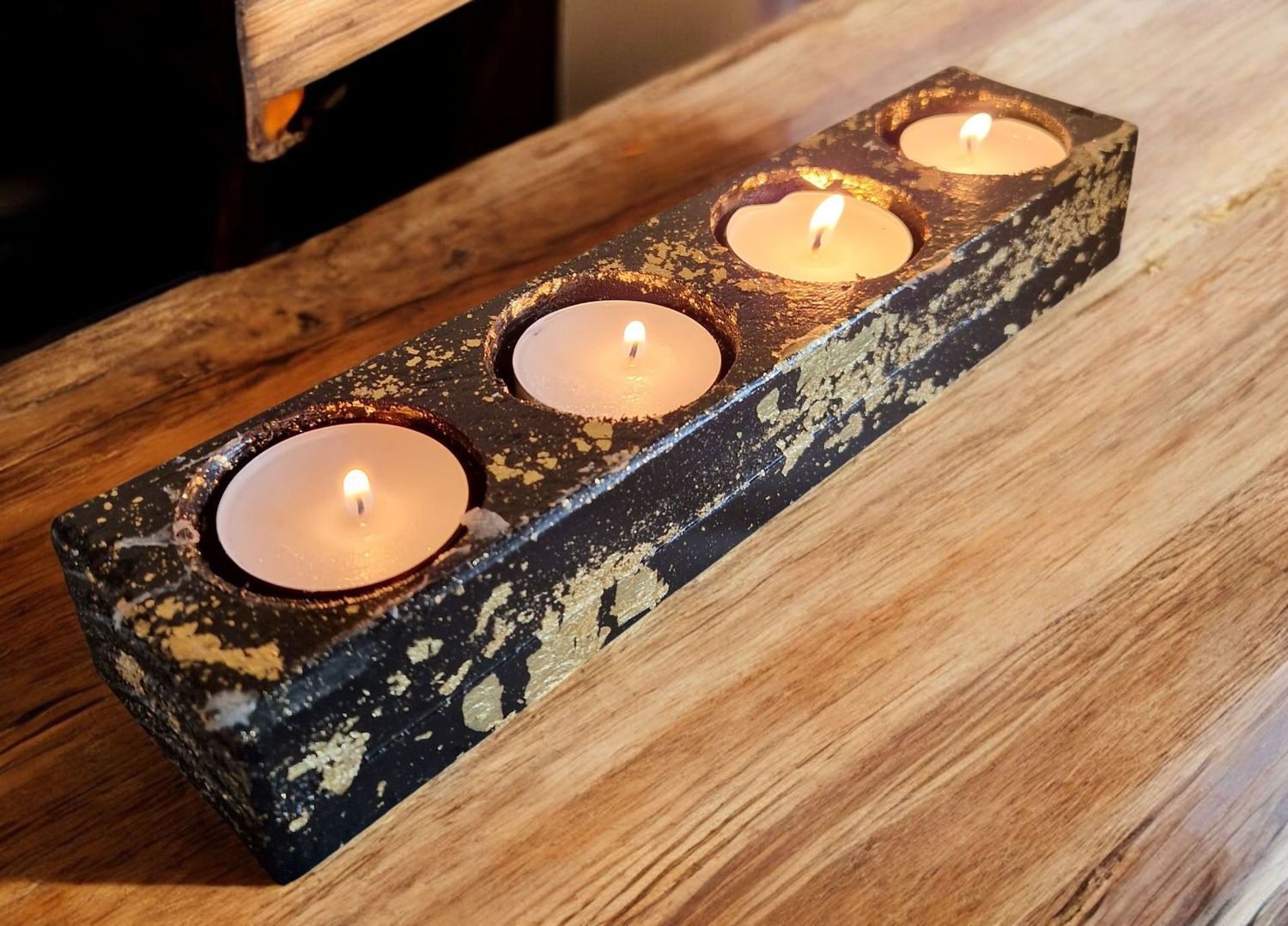 Teelichthalter für 4 Teelichter in schwarz Teelichthalter für 4 Teelichter in schwarz